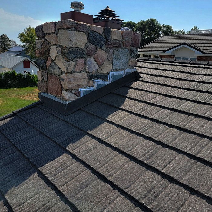 Close-up of a WeatherLok stone-coated shake profile showing the granular stone finish